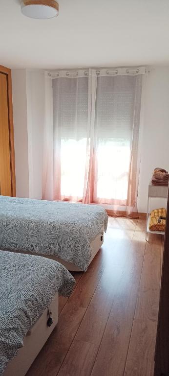 Postel nebo postele na pokoji v ubytování Dúplex El refugio de Porma