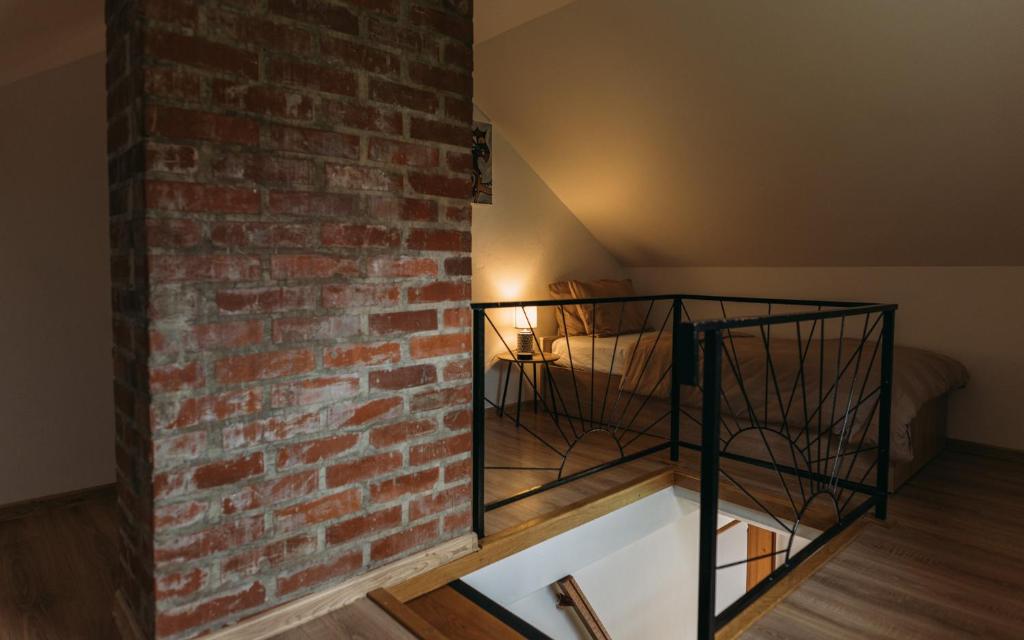 Postel nebo postele na pokoji v ubytování Apartma Hiša na Ravnah with hot tub