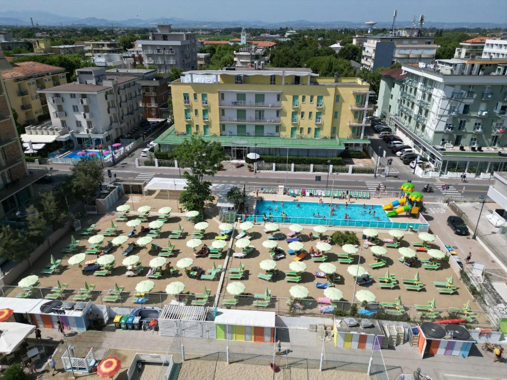 an aerial view of a city with a pool and buildings at Hotel Holiday Park in Bellaria-Igea Marina