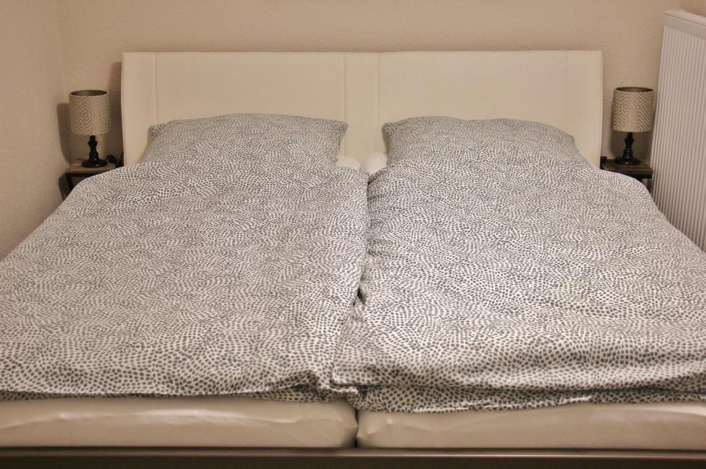 Postel nebo postele na pokoji v ubytování Ferienwohnung am Rosenberg