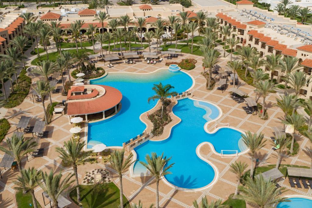 an aerial view of the resort pool at Jaz Almaza Beach Resort, Almaza Bay in Marsa Matruh