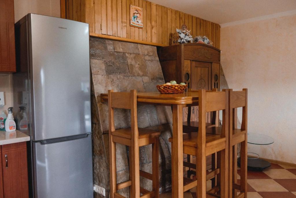 Kuchyň nebo kuchyňský kout v ubytování Будинок з видом на Стару Фортецю