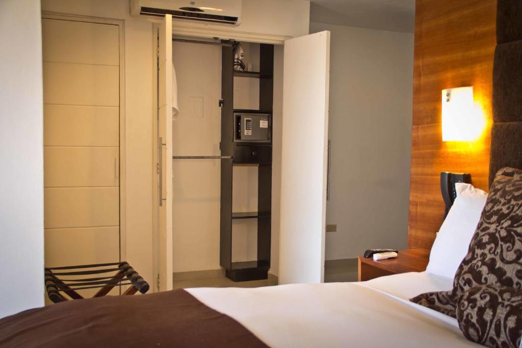 Postel nebo postele na pokoji v ubytování Minister Business Hotel