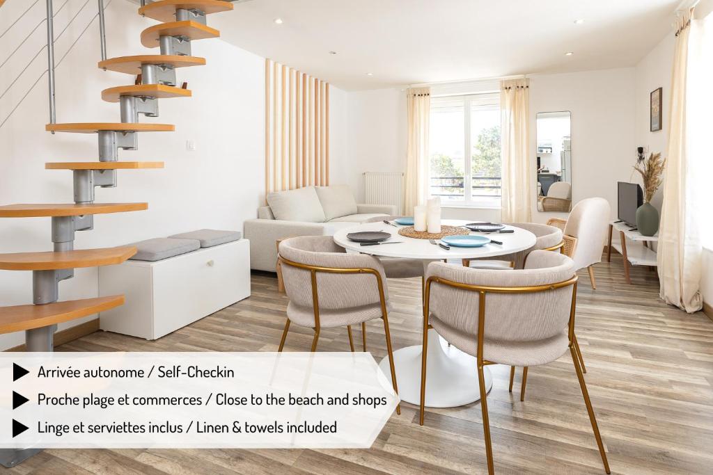 a living room with a table and chairs and a spiral staircase at Duplex Petit-Fort Philippe in Gravelines