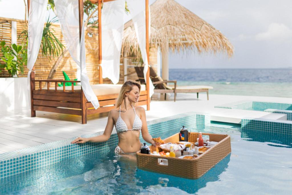 Malahini Kuda Bandos Special Offer Begin your island escape with ease airport pick up and return by shared speedboat at just USD 50 per person stays stay untill end June photo