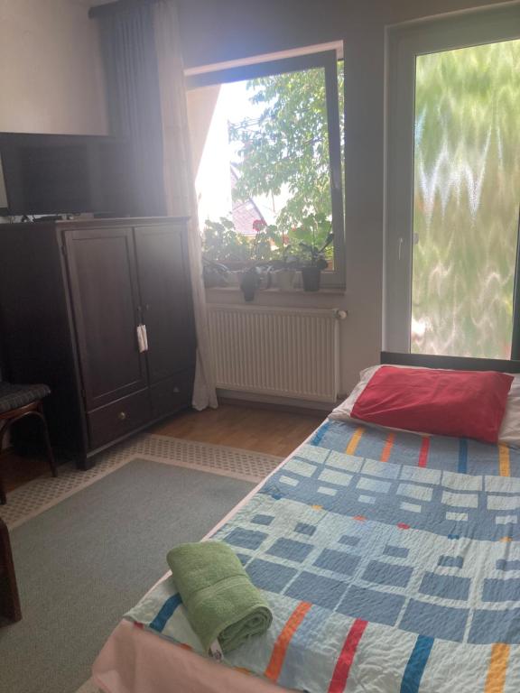 Postel nebo postele na pokoji v ubytování Apartman-Donau Tát