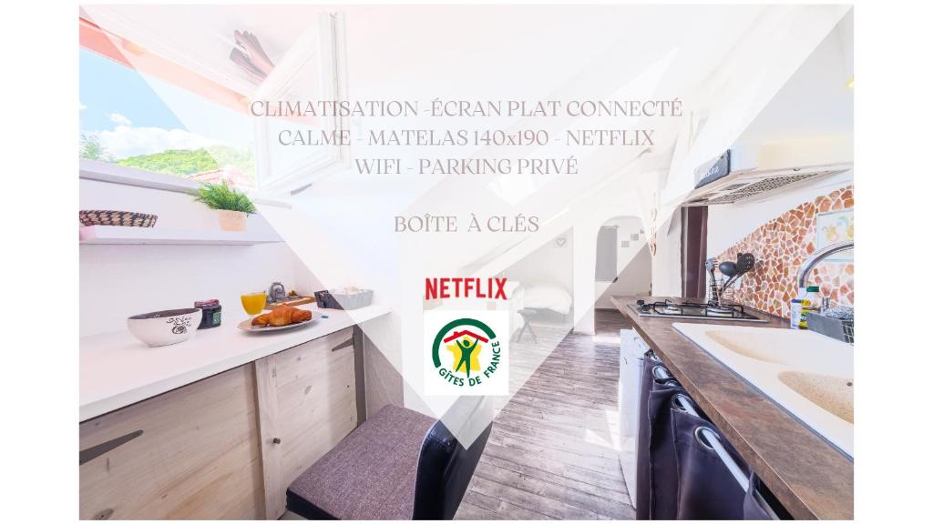 a kitchen with a sign that reads kitchenovation technology conference committee markedinated kitchen wifi at Studio duplex atypique, classé Gîte de France, CLIMATISATION, parking, lit double, calme et cosy, Netflix, wifi, 400m centre, boîte à clés, Gîtes La Tarine in Albertville