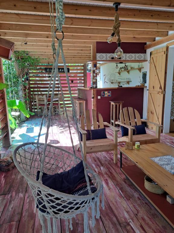 Posezení v ubytování P'tites chambres dans la campagne de Marie Galante