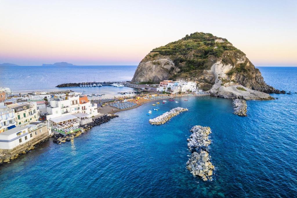 an aerial view of a small island in the ocean at Roccobarocco Boutique Hotel in Ischia