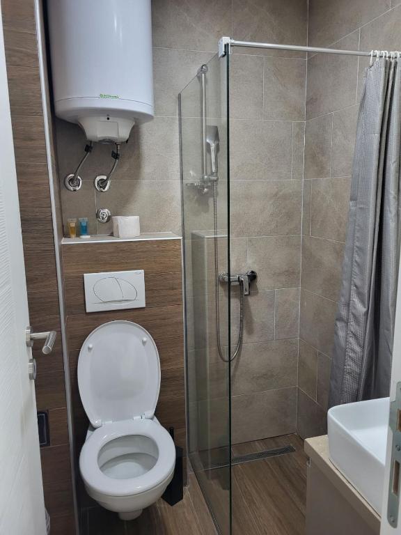 Koupelna v ubytování Kloudscape Apartman Milmari Resort & Spa