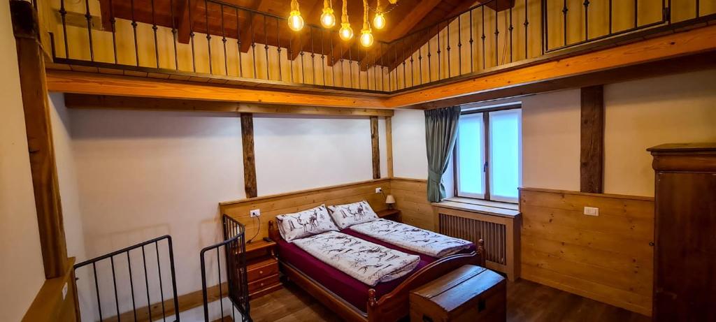 Postel nebo postele na pokoji v ubytování Casa vacanze Al Stalìin