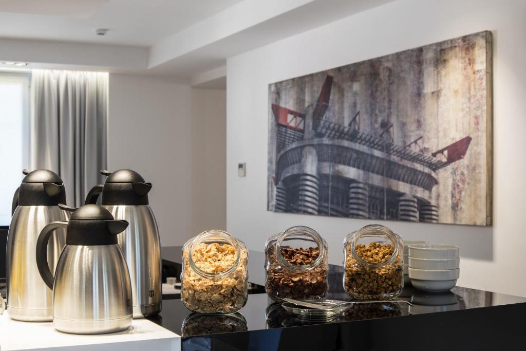 Príslušenstvo na prípravu kávy alebo čaju v ubytovaní Hotel Studio Inn Centrale & Milano Urban Padel