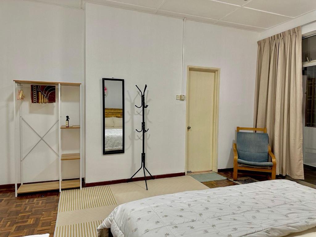 Postel nebo postele na pokoji v ubytování Mijanna Guesthouse - Johor Bahru