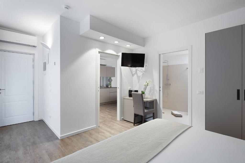 Posteľ alebo postele v izbe v ubytovaní Hotel Studio Inn Centrale & Milano Urban Padel