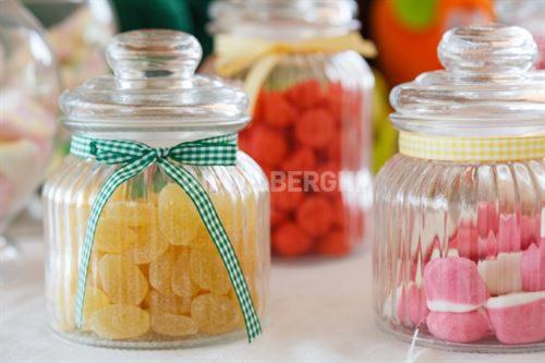 two glass jars filled with different types of fruit at Esperia Boutique Family Hotel in Cesenatico