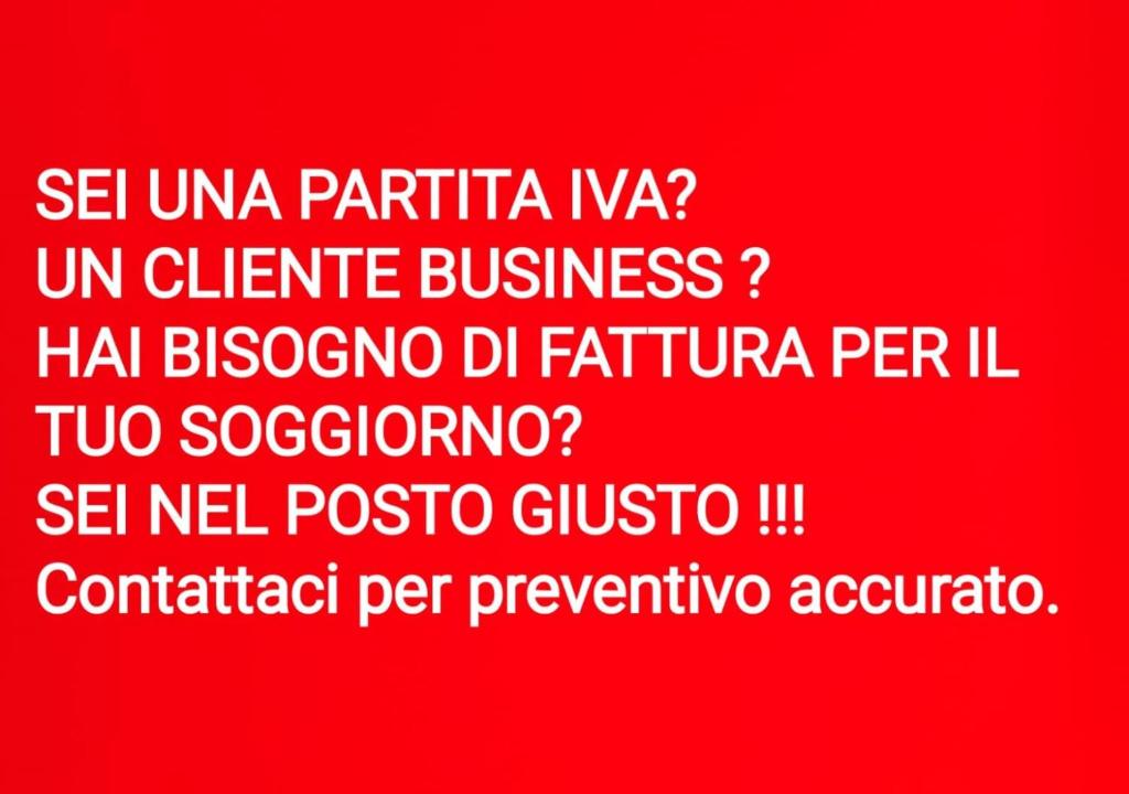 un fond rouge avec un texte blanc sur le fond dans l'établissement UN PASSO DAL MARE bed&breakfast San Salvo Marina, à San Salvo