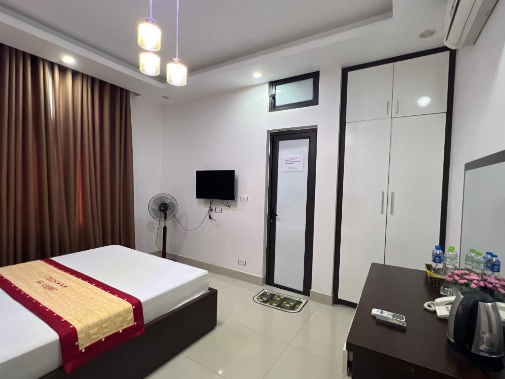 TV a/nebo společenská místnost v ubytování Hotel Liberty Violet