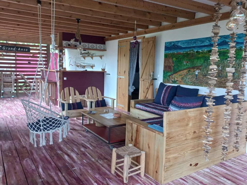 Posezení v ubytování P'tites chambres dans la campagne de Marie Galante