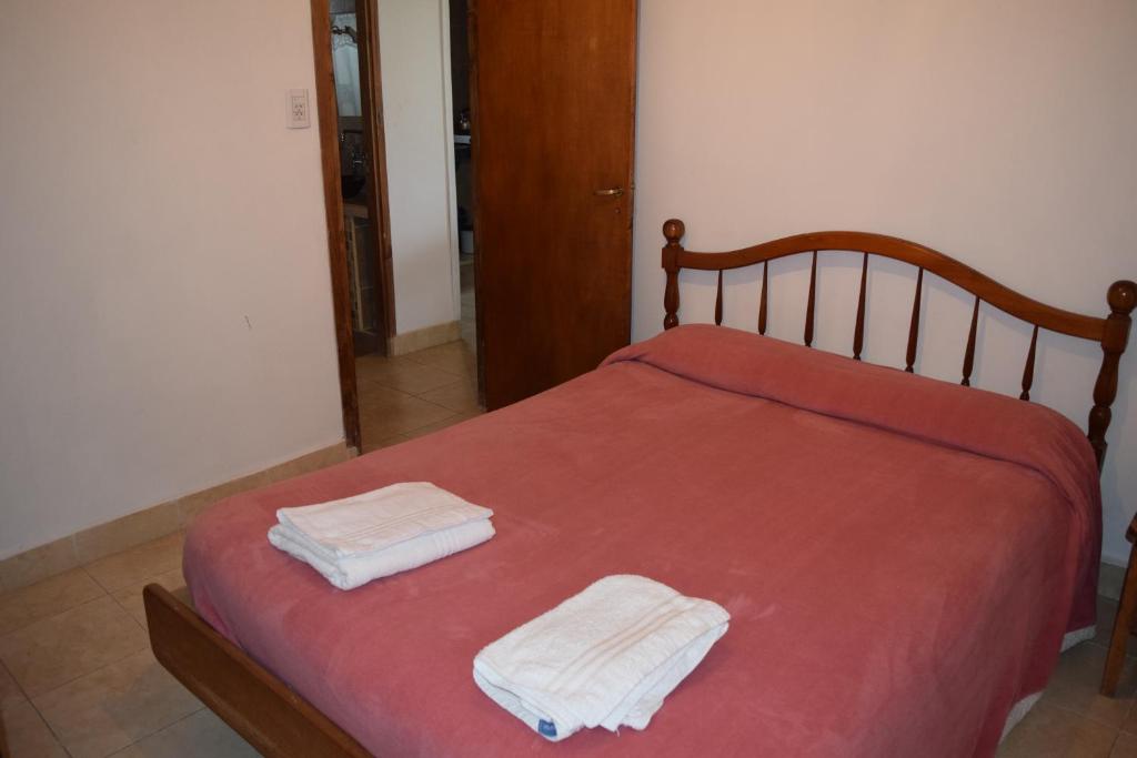 Ένα ή περισσότερα κρεβάτια σε δωμάτιο στο Cabaña Guadalupe