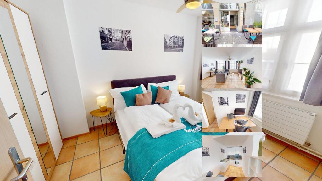 um pequeno quarto com uma cama e uma mesa em Solution-Grischun - Stadtwohnung - Kaffee&Tee - Arbeitsplatz - TV em Chur