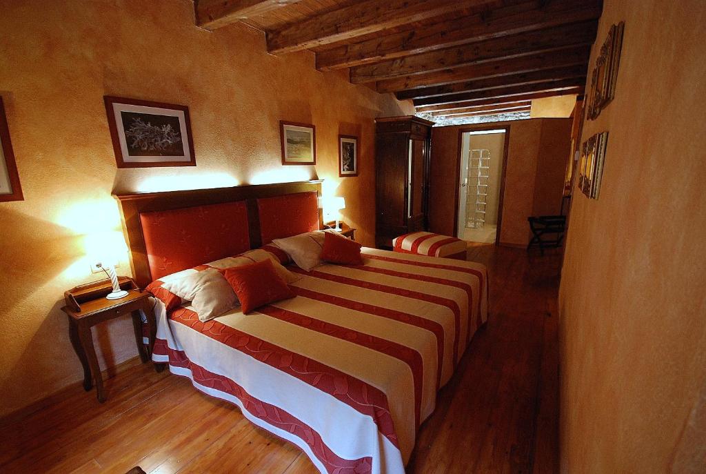 Postel nebo postele na pokoji v ubytování Casa rural Daudén