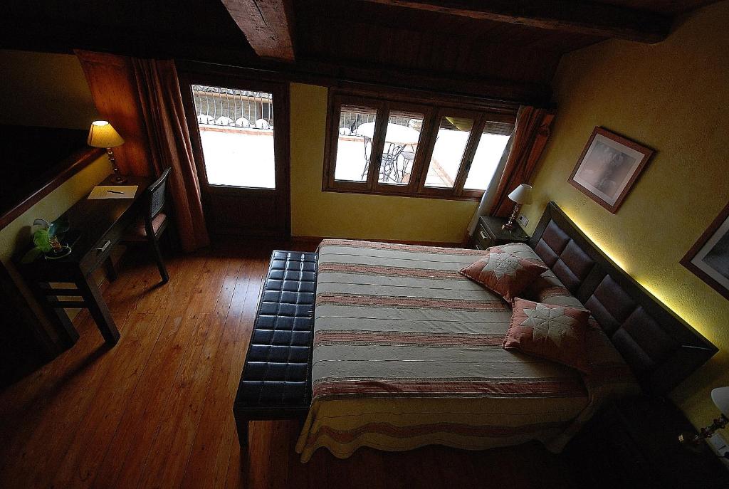 Postel nebo postele na pokoji v ubytování Casa rural Daudén