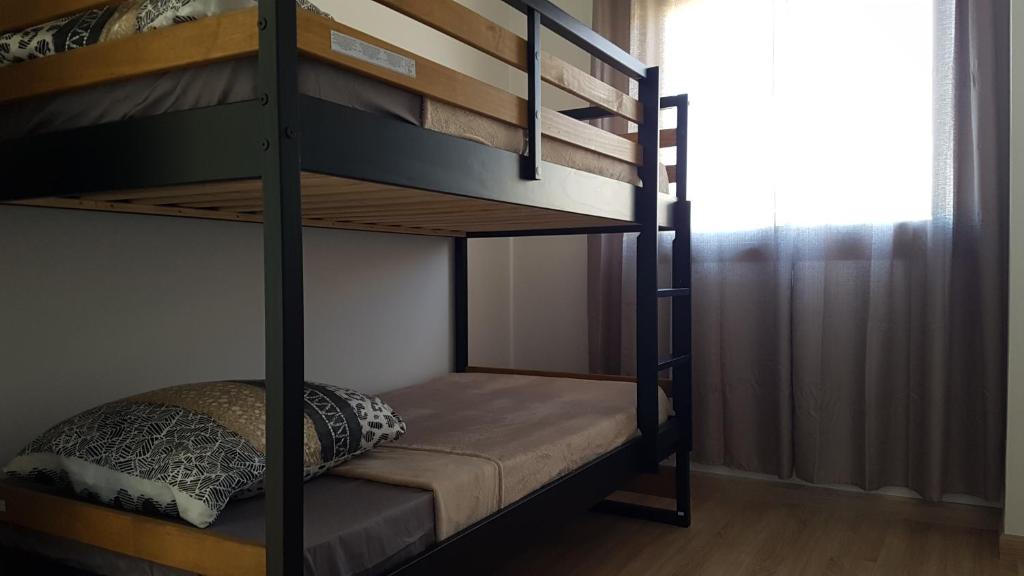 Postel nebo postele na pokoji v ubytování Le P'tit Rubis