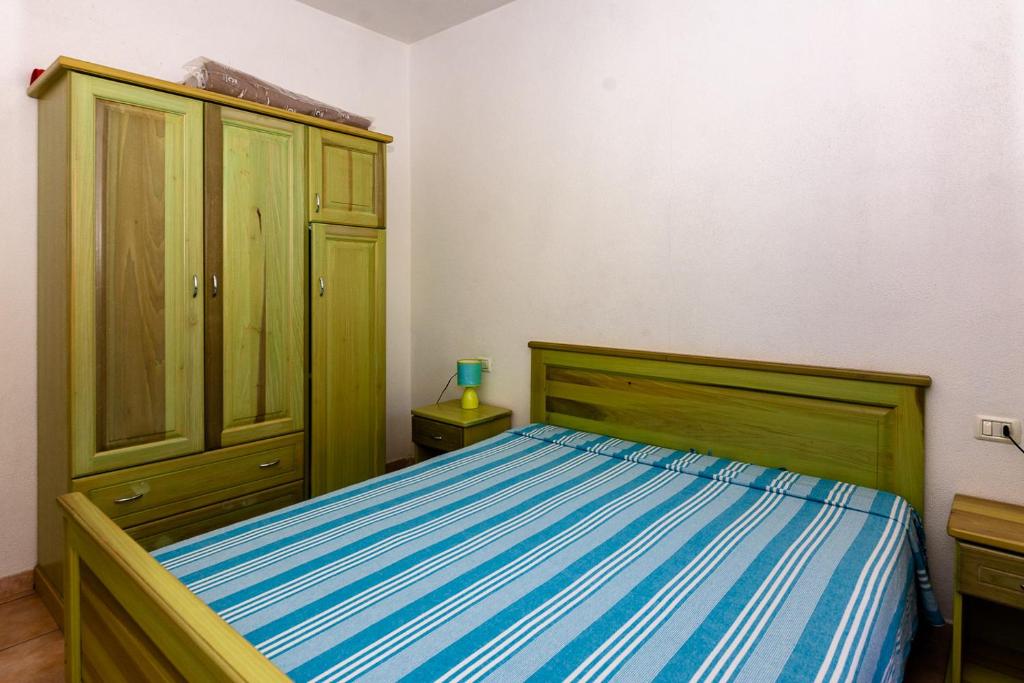 Łóżko lub łóżka w pokoju w obiekcie Casa Faedda Residence Weber