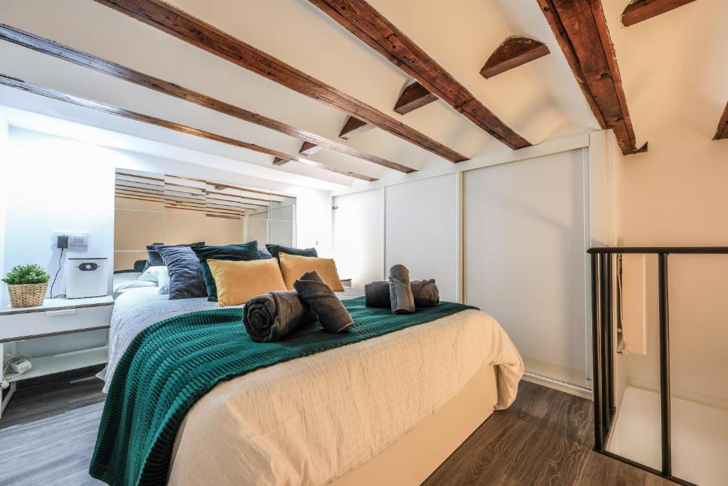 Ένα ή περισσότερα κρεβάτια σε δωμάτιο στο Discover Madrid from our cozy studio
