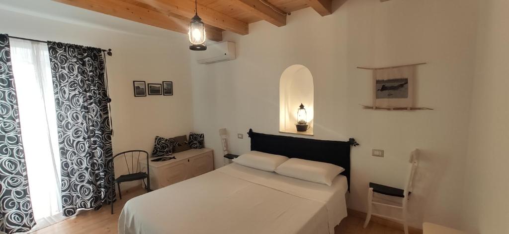 Postel nebo postele na pokoji v ubytování B&B Mastro Francesco