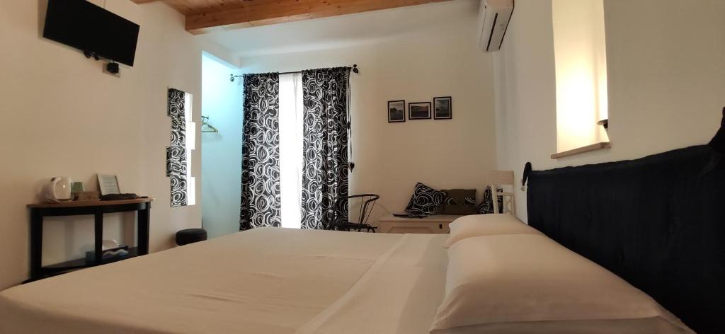 Postel nebo postele na pokoji v ubytování B&B Mastro Francesco