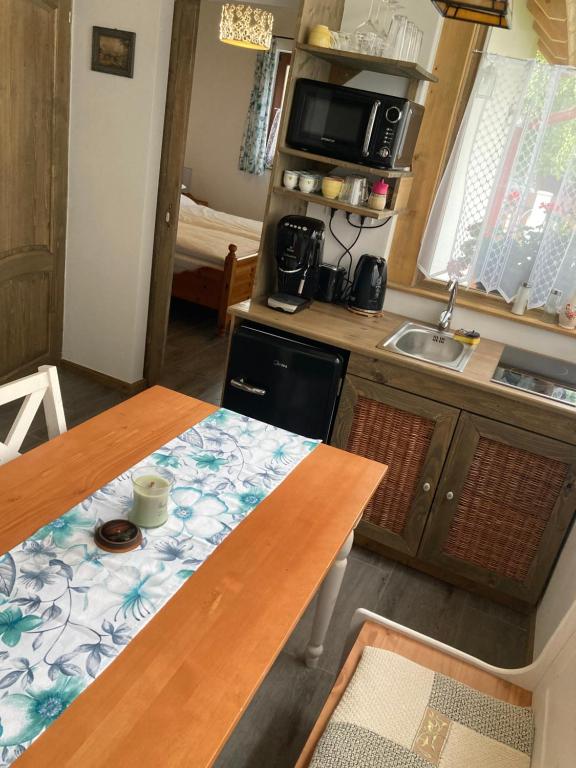 Kuchyň nebo kuchyňský kout v ubytování Nyírfa-Lak Apartman