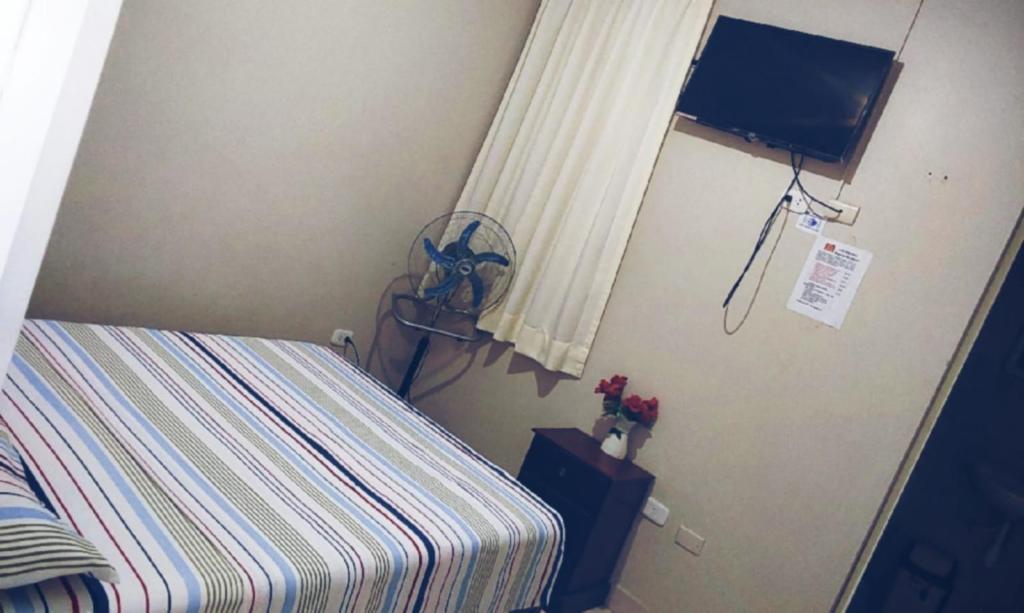 Postel nebo postele na pokoji v ubytování Hospedaje Residencial Los Fresnos - Miraflores Piura