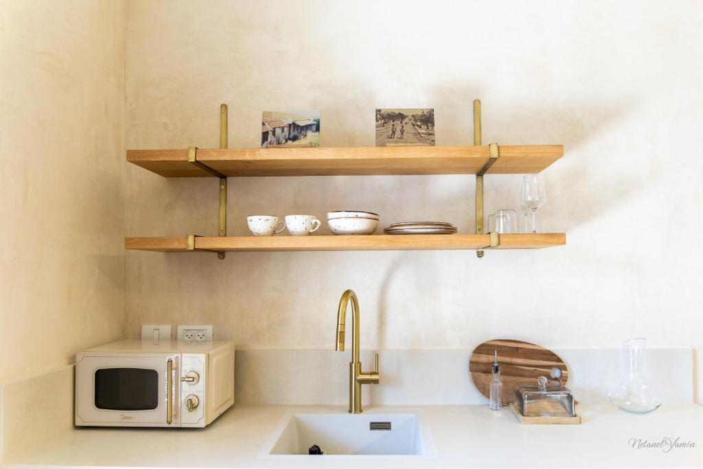 Kuchyň nebo kuchyňský kout v ubytování Hagafen Boutique Suites