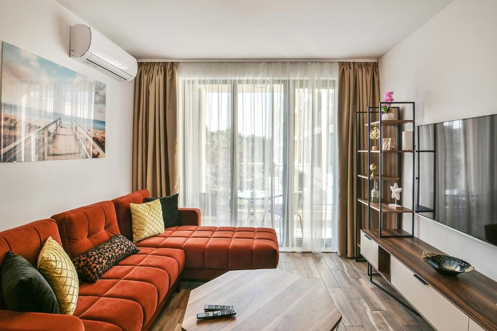 TV a/nebo společenská místnost v ubytování The Shangri-LA flat