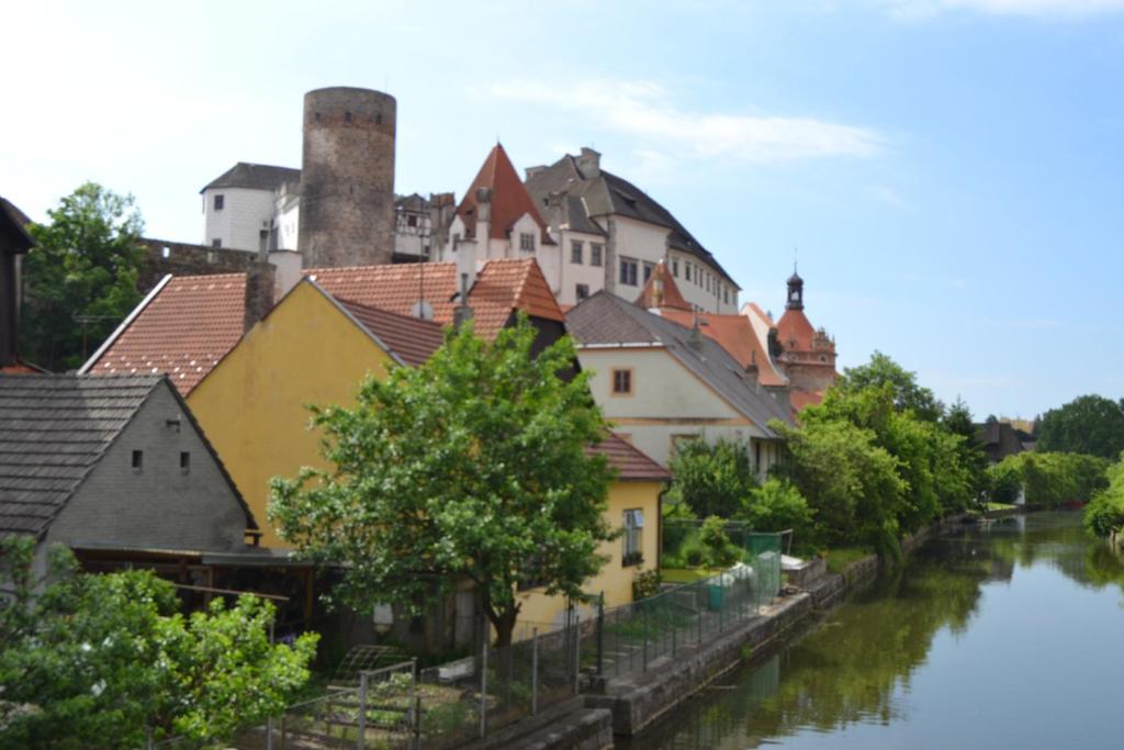 a view of a town next to a river at Penzion U Tomáše in Jindřichŭv Hradec