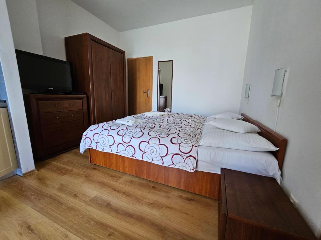Postel nebo postele na pokoji v ubytování Penzion pod Krivanom