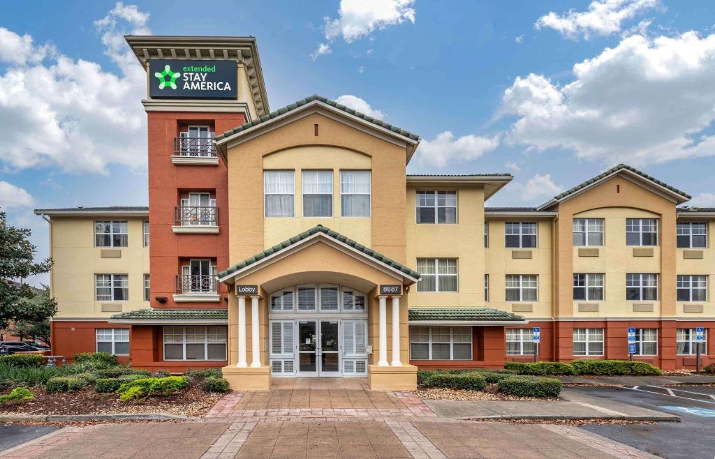 a rendering of a hotel with a building at Extended Stay America Suites - Orlando - Southpark - Commodity Circle in Orlando