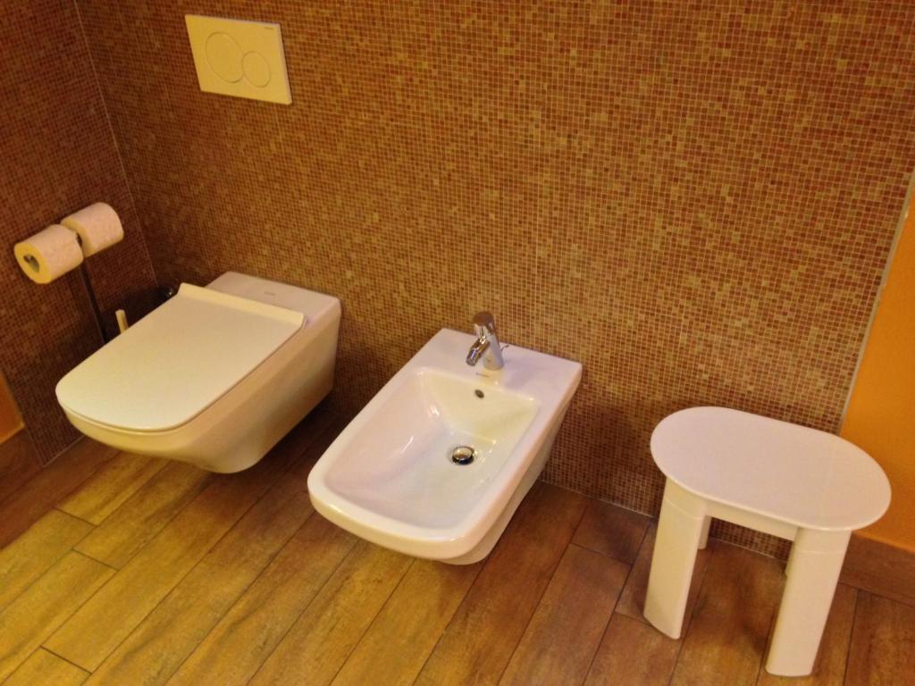 Koupelna v ubytování Hotel Don Abbondio