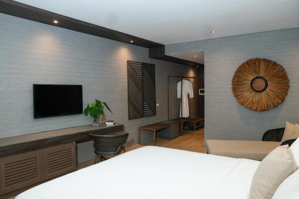 TV a/nebo společenská místnost v ubytování Adelina Hotel and Suites