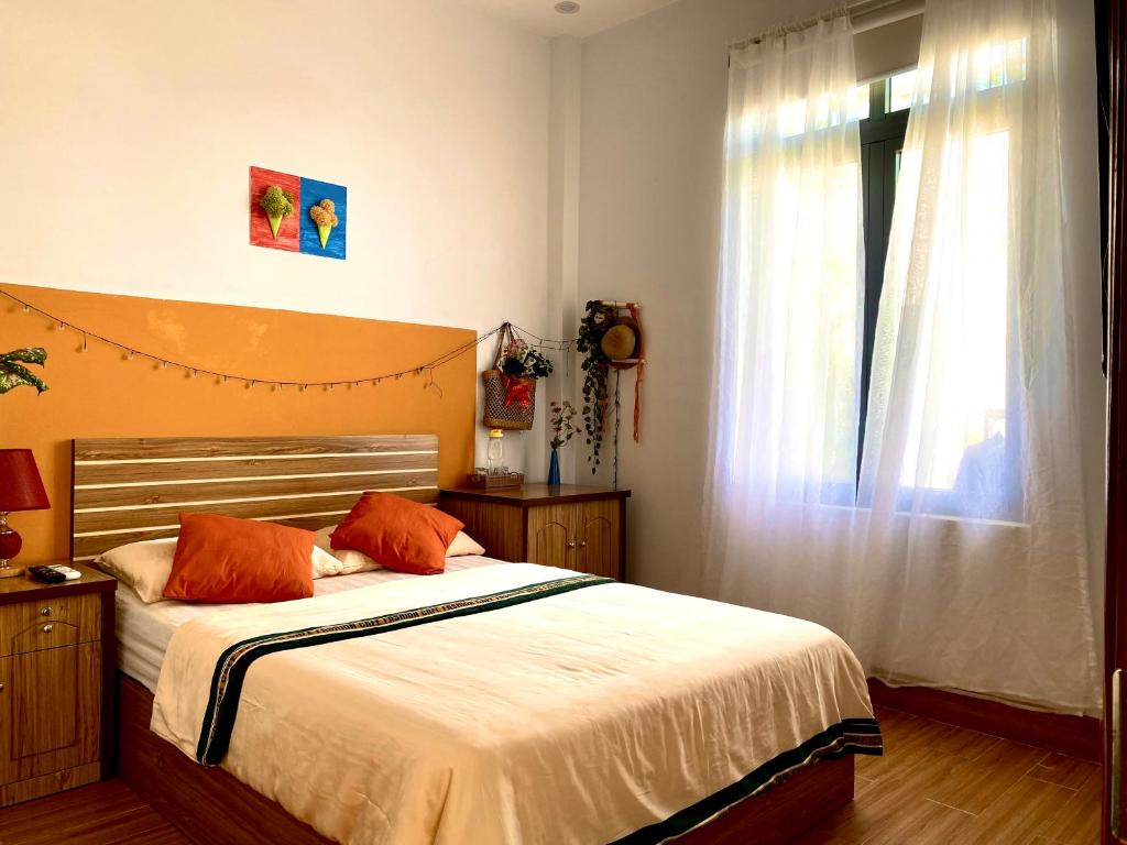 Postel nebo postele na pokoji v ubytování Letters Bà Triệu