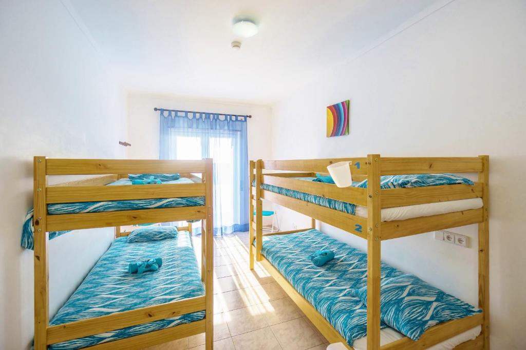 Postel nebo postele na pokoji v ubytování H2O GuestHouse
