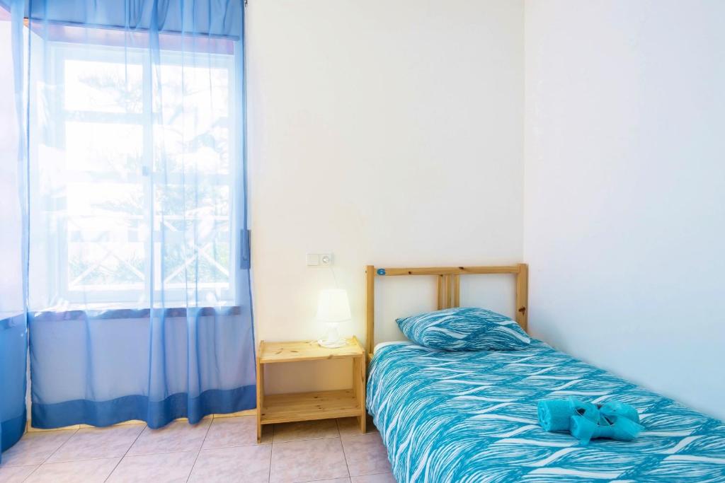 Postel nebo postele na pokoji v ubytování H2O GuestHouse