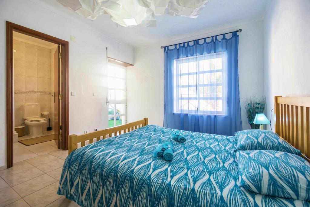 Postel nebo postele na pokoji v ubytování H2O GuestHouse