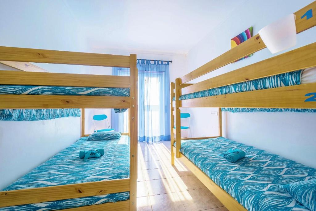 Postel nebo postele na pokoji v ubytování H2O GuestHouse