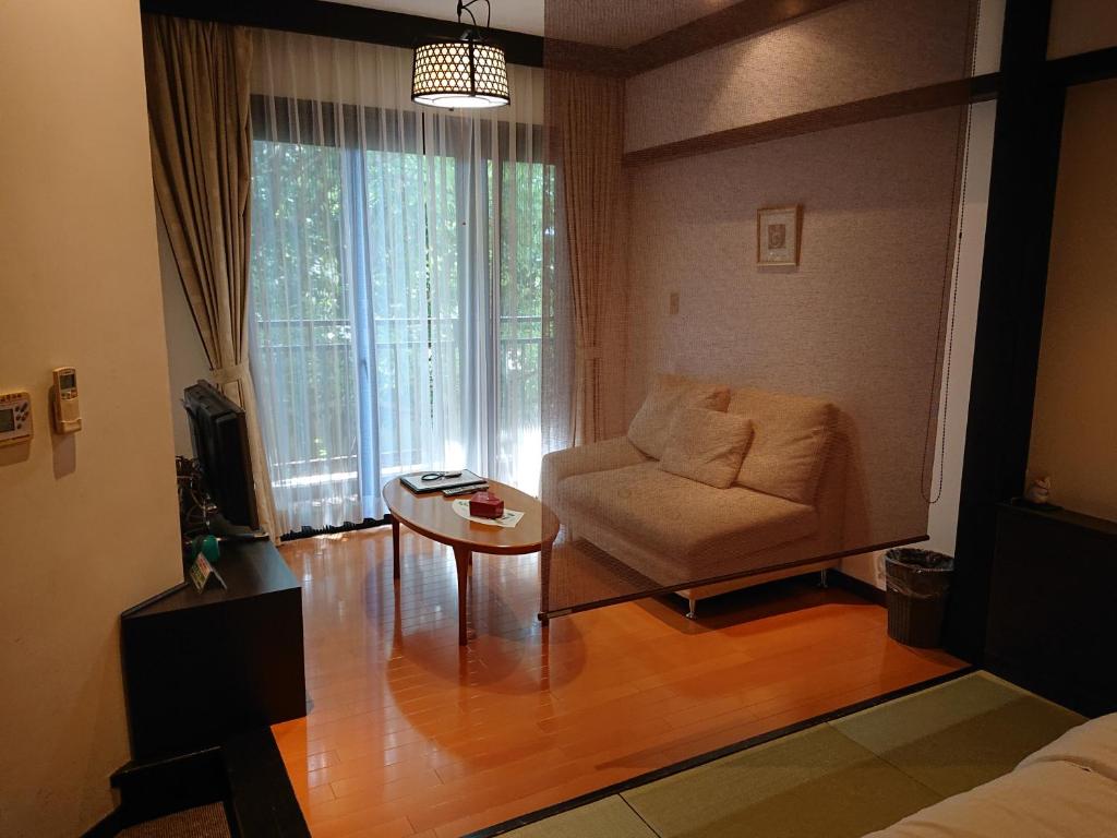 Posezení v ubytování Kasuga Hotel