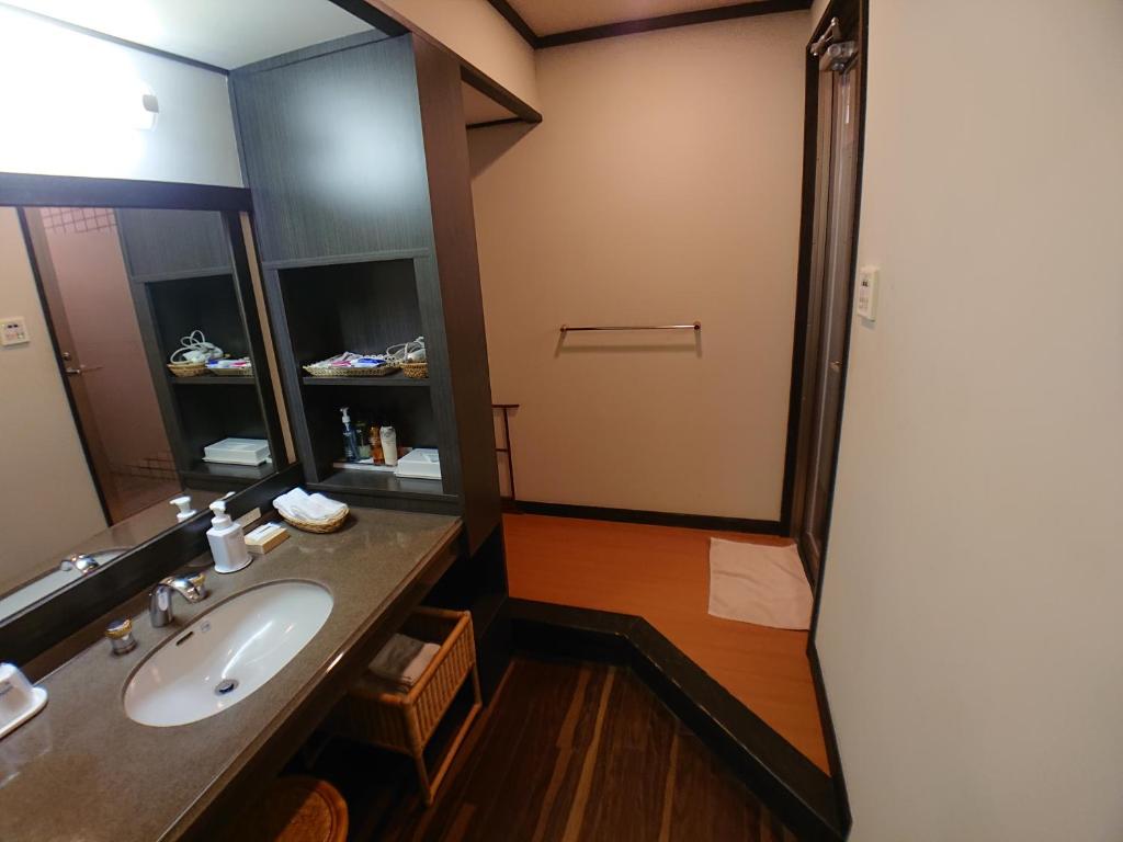 Koupelna v ubytování Kasuga Hotel