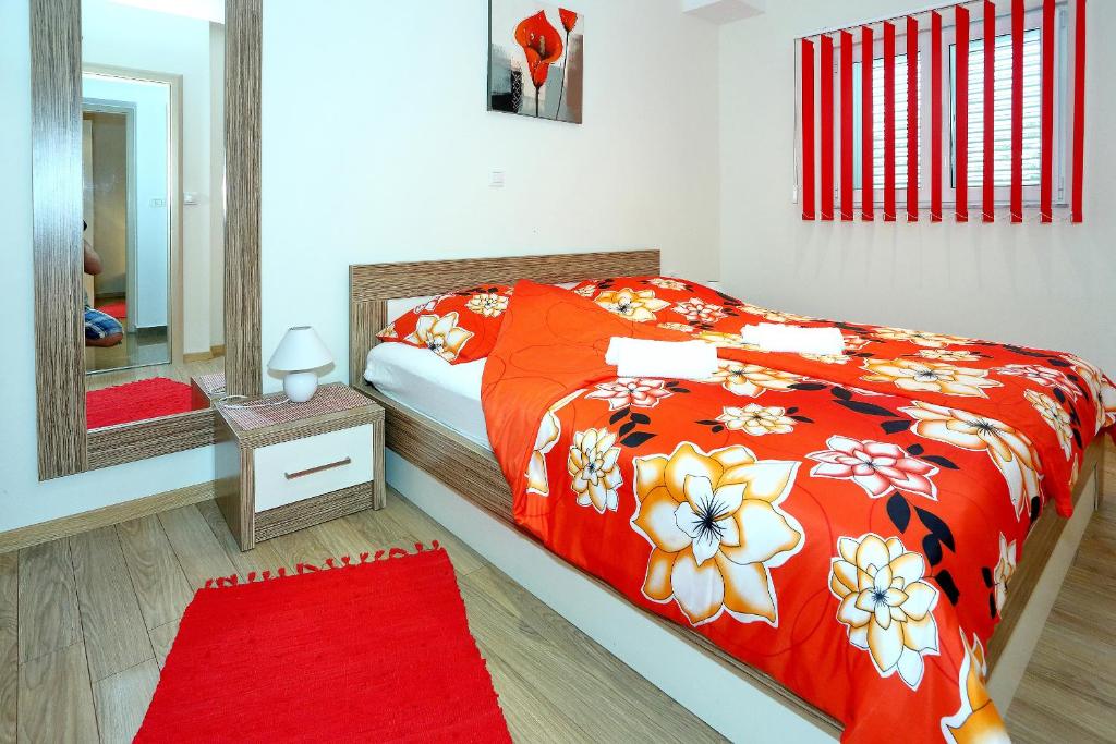Postel nebo postele na pokoji v ubytování Apartments Melita