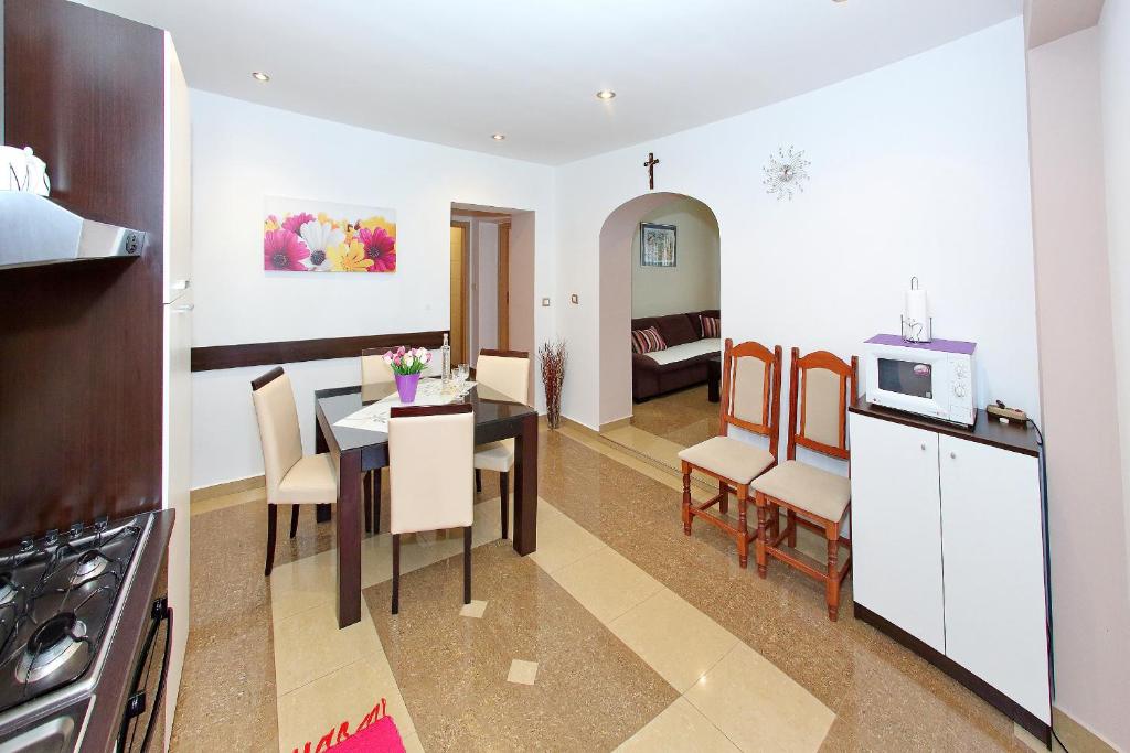 Kuchyň nebo kuchyňský kout v ubytování Apartments Melita