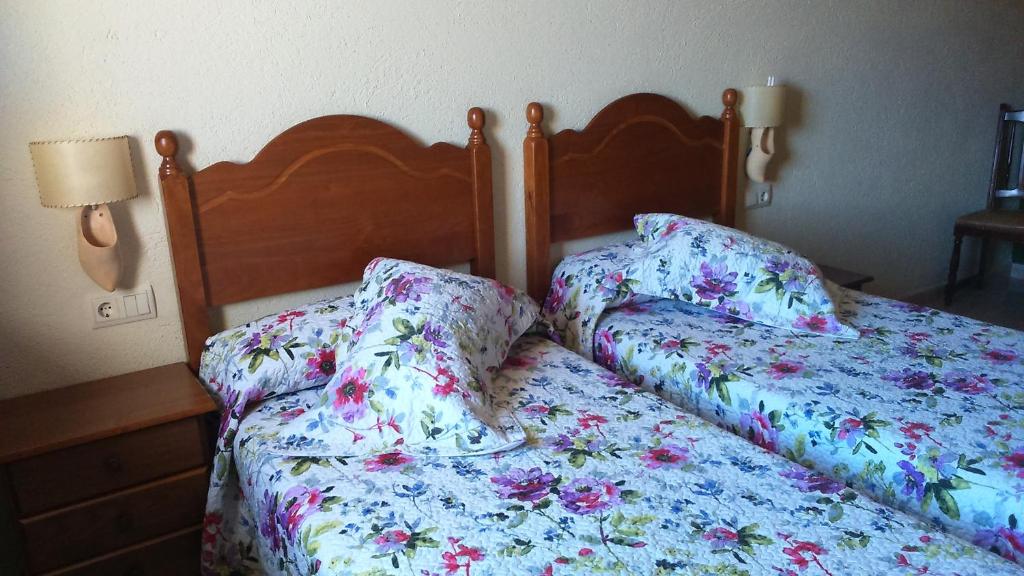 Postel nebo postele na pokoji v ubytování Cal Rosetó